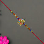 Lord Jagannath Rakhi With Multicolor Beads