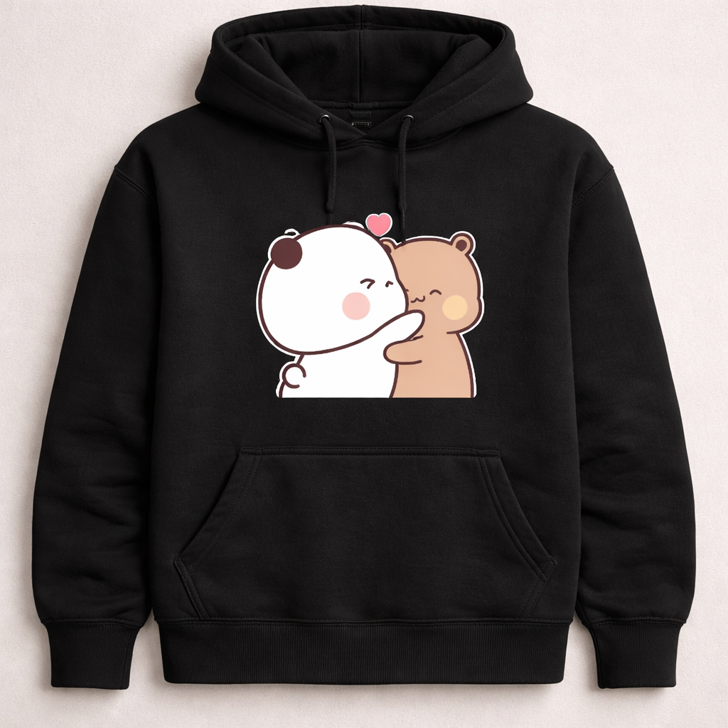 Black hoodie with cartoon bear design on a light beige background