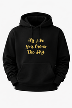 Black hoodie with gold text 'Fly Like You Owns The Sky' on a white background