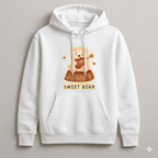 White hoodie with a 'Sweet Bear' graphic on a gray background