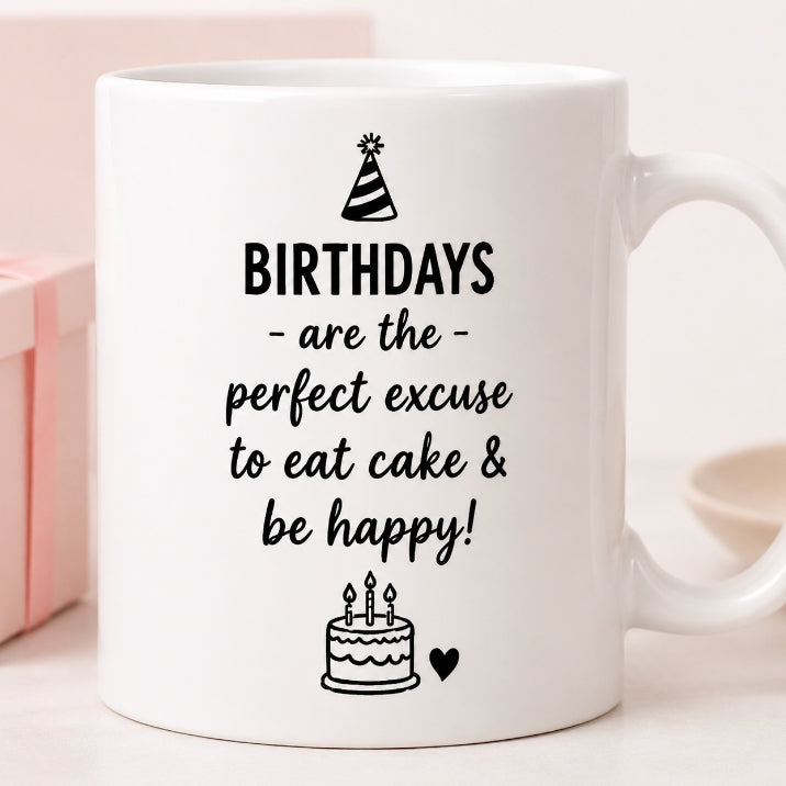 White mug with birthday-themed text and graphics on a light background