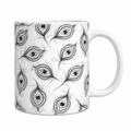 White mug with black peacock feather pattern on a white background